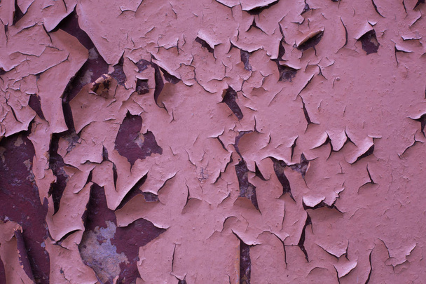 Peeling paint, textúra a háttér, a rózsaszín peeling paint  - Fotó, kép