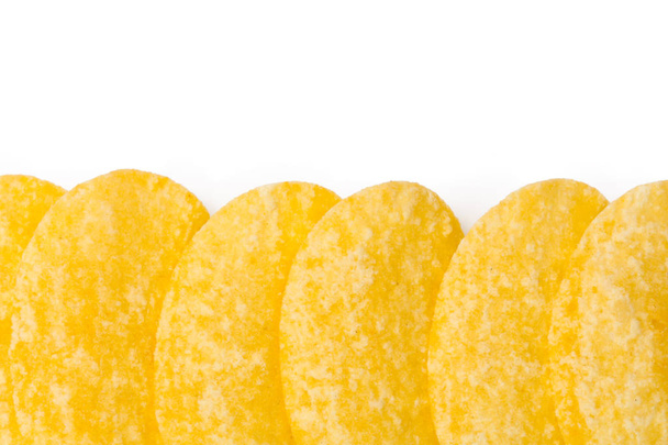 yellow potato chips isolated on white background  - Foto, Imagen