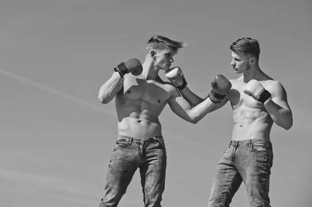 Winner and loser in boxing gloves. - Foto, afbeelding