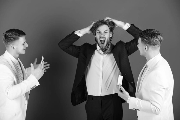 Man shouting and pulling hair in anger - 写真・画像