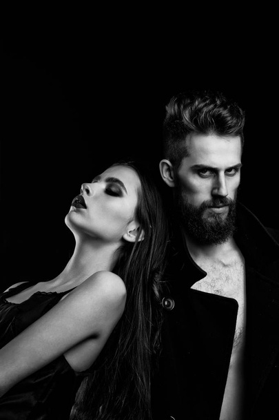 couple of bearded man, woman in black with fashionable makeup - Foto, imagen