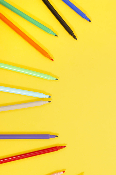 set of felt pens over yellow background  - Photo, Image