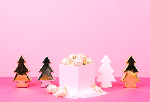 Christmas tree balls on a pink background. - Photo, image