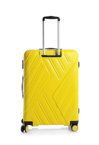 Yellow suitcase for travelling on white background - Fotografie, Obrázek