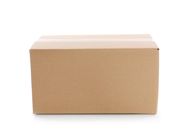 Cardboard parcel box on white background. Mockup for design - Фото, изображение
