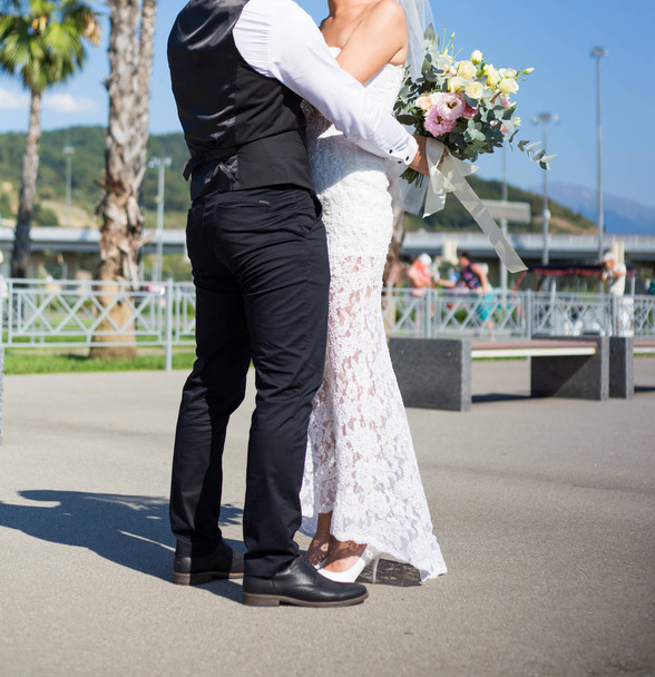 Newlyweds are dancing on the street - Photo, Image