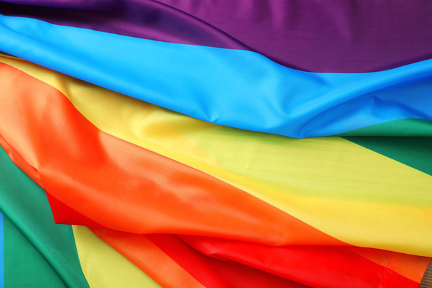 Rainbow gay flag as background. LGBT concept - Фото, зображення