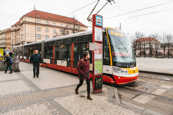 Prague, December 25, 2017 The tram arrived at the tram station and got ready to leave. Daily city life - Photo, Image