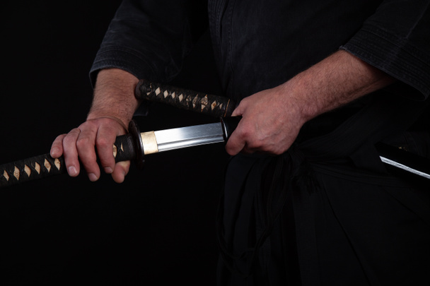 Yakuza holding katana zwaard - Foto, afbeelding