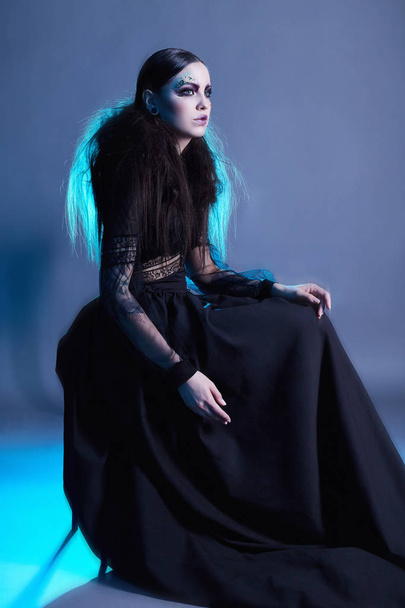 fashion witch woman with halloween make-up. halloween concept. mystic girl - Foto, Imagem