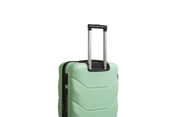 Suitcase on wheels light green color on a white isolated background. - Фото, изображение