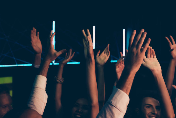 Diverse cheerful friends audience with raised hands at popular w - Φωτογραφία, εικόνα