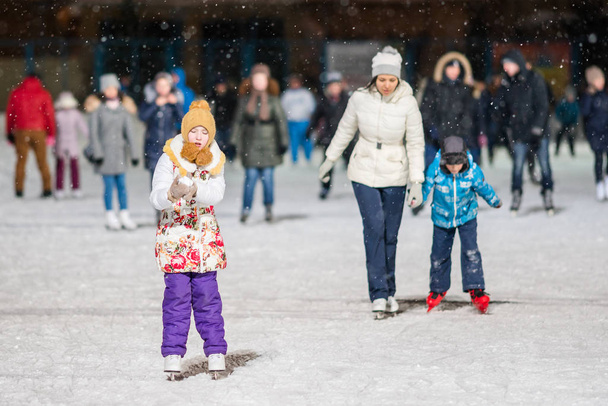 KAZAN, RUSSIA, 22 JANUARY, 2017: People on skating rink in the evening - Fotó, kép