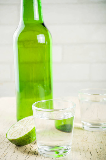 Traditional korean alcohol drink soju on light concrete background copy space - Foto, immagini