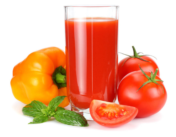 Tomato juice in glass jug with tomato, garlic, spices, and basil isolated on white background - Foto, afbeelding