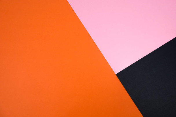 Fekete, narancssárga és rózsaszín színű papír geometriai lapos laikus háttér - Fotó, kép