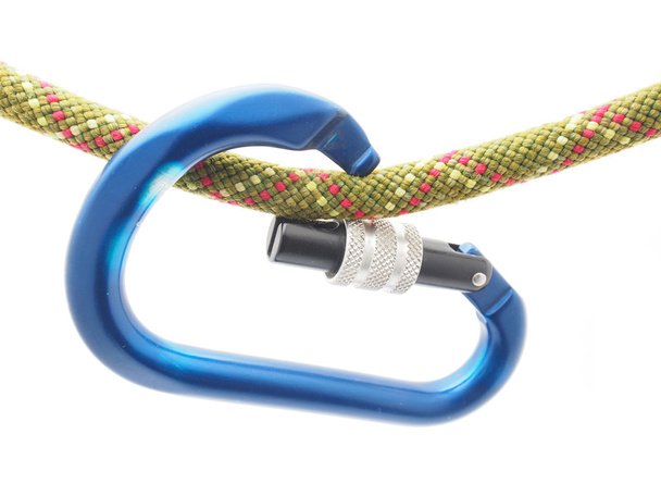 climbing rope and a carabiner on a white background - Foto, Imagen