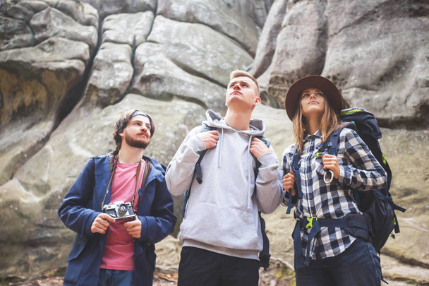 Portrait Of Adventure Students Walking On The Rocks - Zdjęcie, obraz