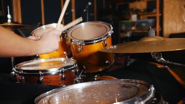 Drummer plays music on wet drums in studio - Footage, Video
