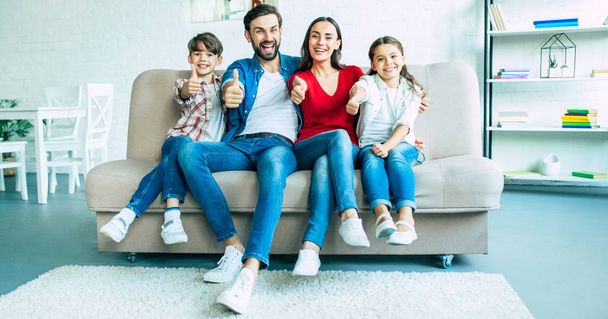 Young family spending happy time at home  - Photo, Image