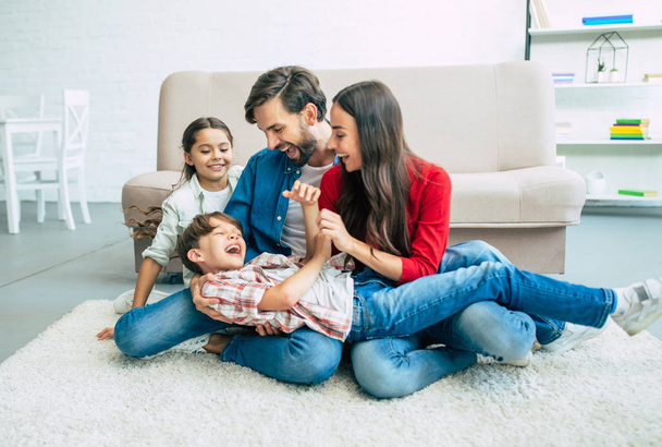 Young family spending happy time at home  - Photo, image
