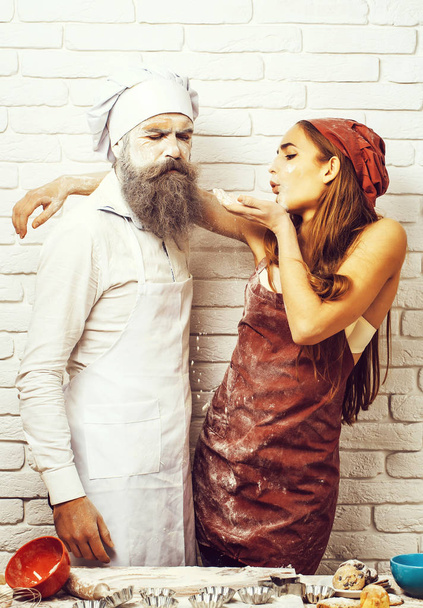 Messy pretty girl and cook - Photo, image