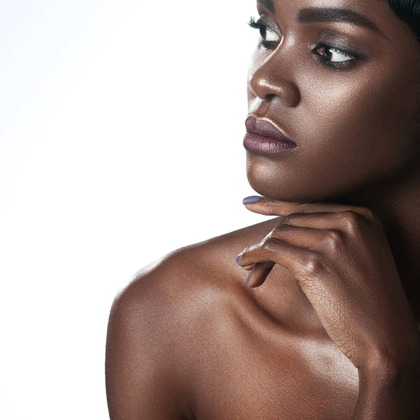 Young beautiful black woman with clean perfect skin makeup. Beauty portrait - 写真・画像