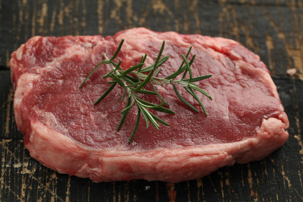 fresh slice of meat on wooden background - Photo, Image