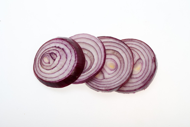 Sliced onion isolated on white - Foto, afbeelding