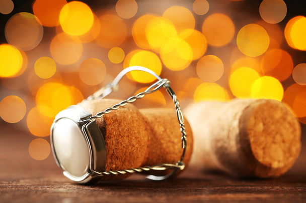 Champagne corks with cap on light background - Photo, Image