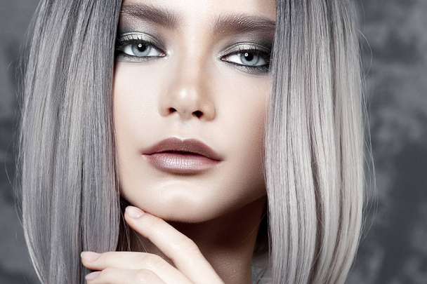 Young beautiful girl with silver make-up and ash hair. Beauty close-up portrait - 写真・画像