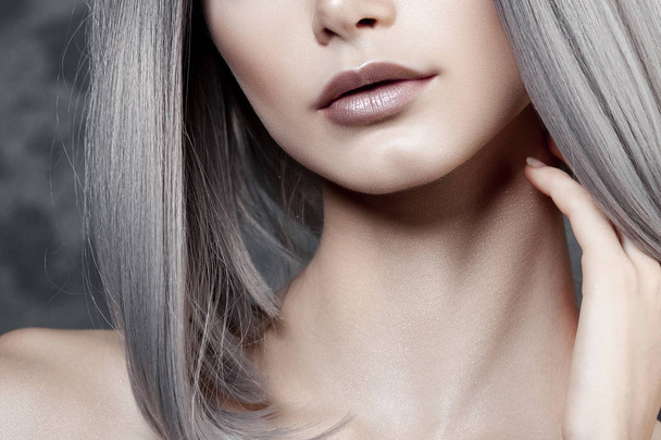 Young beautiful girl with silver make-up and ash hair. Anonymous beauty close-up portrait - Фото, зображення