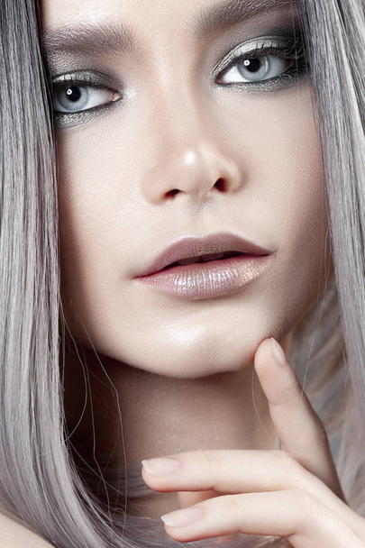 Young beautiful girl with silver make-up and ash hair. Beauty close-up portrait - Fotó, kép