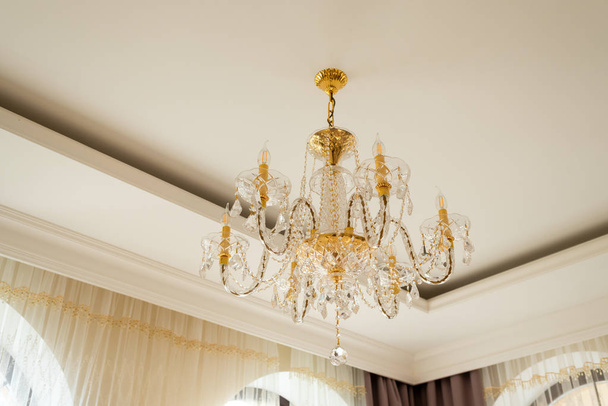 Crystal chandelier in the interior - Photo, Image