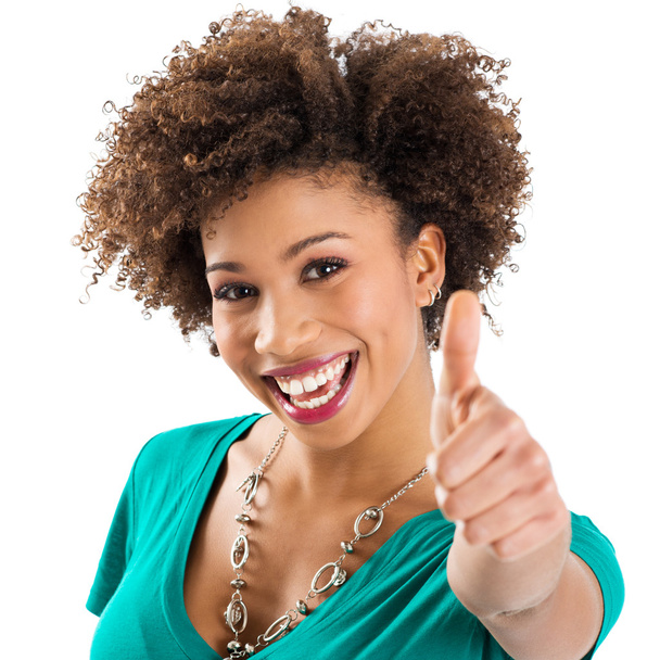 Portrait Of Young Woman Showing Thumb Up Sign - Foto, afbeelding