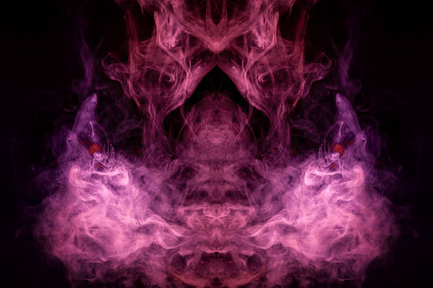 Fantasy print for clothes: t-shirts, sweatshirts. Pink and red cloud of smoke in the form of a monster  of  black isolated background. Background from the smoke of vape. - Photo, Image