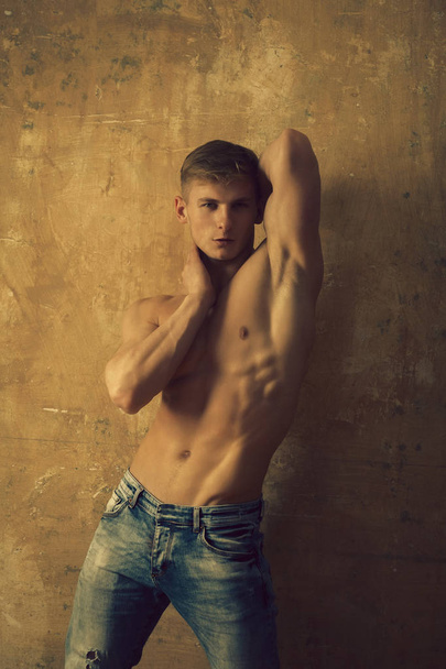 strong athletic man, fitness model, torso showing six pack abs - Fotó, kép