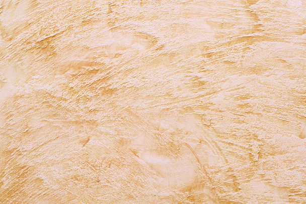 Plâtre beige décoratif sur le mur. Texture. Contexte
. - Photo, image