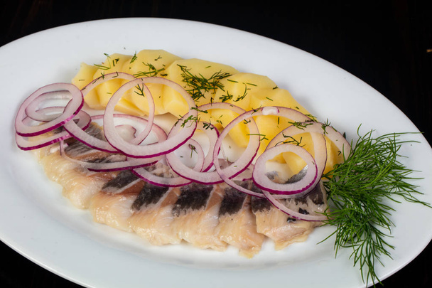 Herring fillet with potato and onion - Foto, immagini