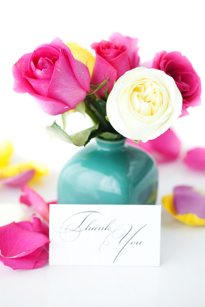 bouquet of colorful roses in vase,petals and card with the words - Foto, imagen