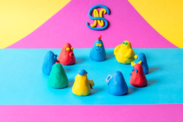 color plasticine figures on bright background - Photo, Image