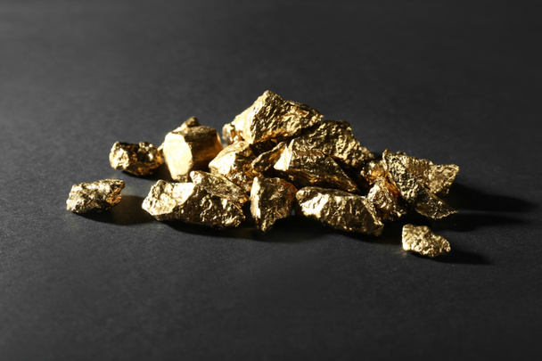 Gold nuggets on black background - Photo, Image