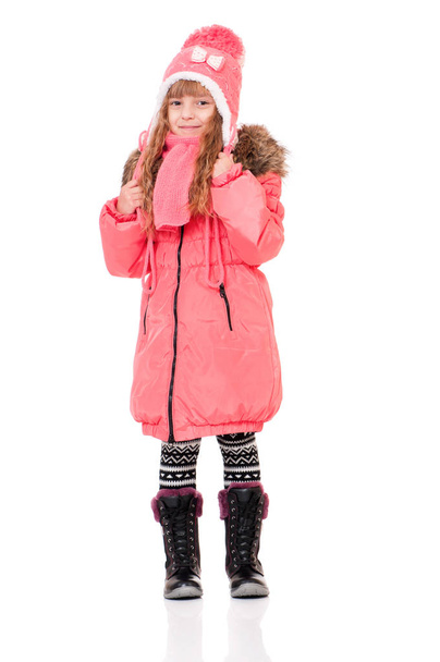 Little girl dressed with winter clothes - Foto, Imagen