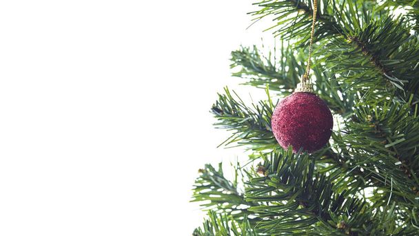 Weihnachtsbaumschmuck Kugelstern Gold auf abstraktem Hintergrund für ein frohes neues Jahr. - Foto, Bild