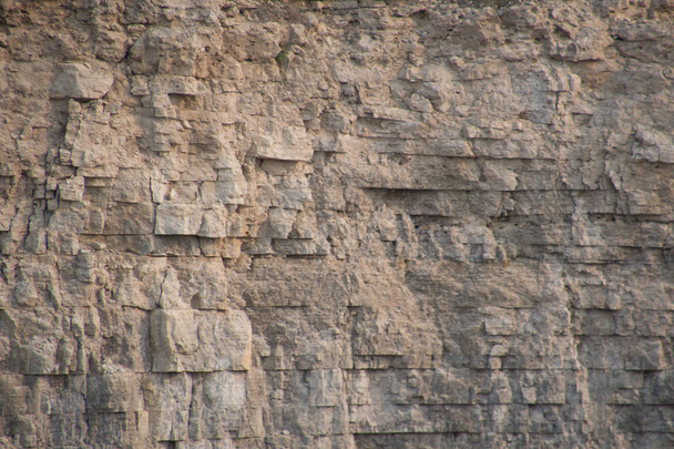 クローズ アップ石灰岩の岩の表面風化層と地質 walpaper または背景の詳細を示します。横向き - 写真・画像