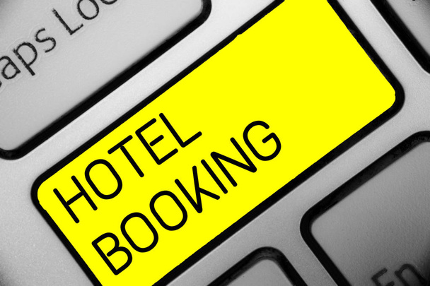 Conceptual hand writing showing Hotel Booking. Business photo text Online Reservations Presidential Suite De Luxe Hospitality Keyboard yellow key computer computing reflection document. - Photo, Image