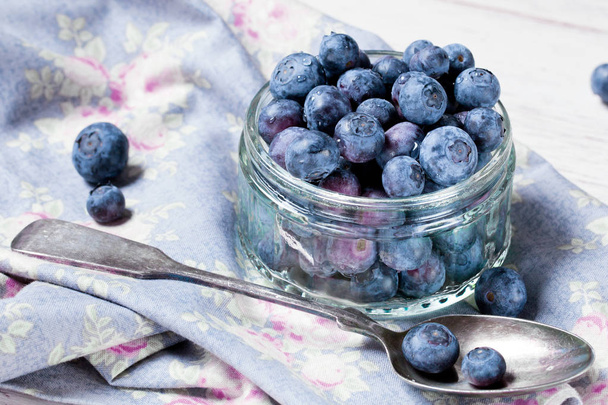Blueberry antioxidant organic superfood in a bowl concept for healthy eating and nutrition - Фото, изображение