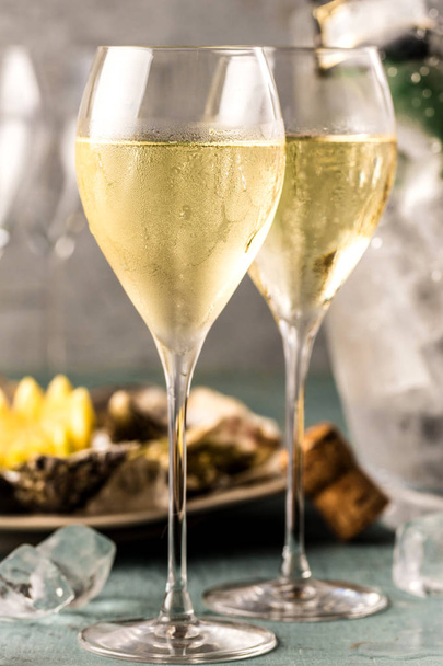 beautiful appetizer oysters and glasses champagne - Foto, imagen