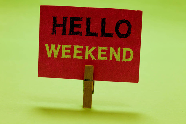 Text sign showing Hello Weekend. Conceptual photo Getaway Adventure Friday Positivity Relaxation Invitation Clothespin holding red paper important communicating messages ideas. - 写真・画像
