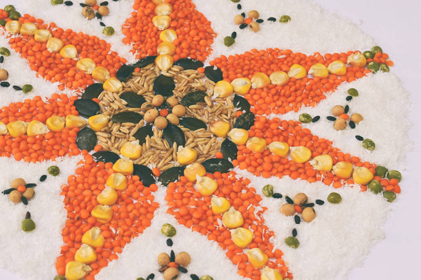 Mandala of cereals, grains and seeds. Gluten-free concept. Corn, coconut, rice, oats, lentils, soy, pumpkin seed Healthy food Top view Copy space - Photo, Image
